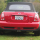 Illustration for article titled 2007 Playmate Of The Year’s Mini S Drop-Top Pops Up On eBay